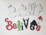 DYI unpainted Grinch themed tree & Believe sign